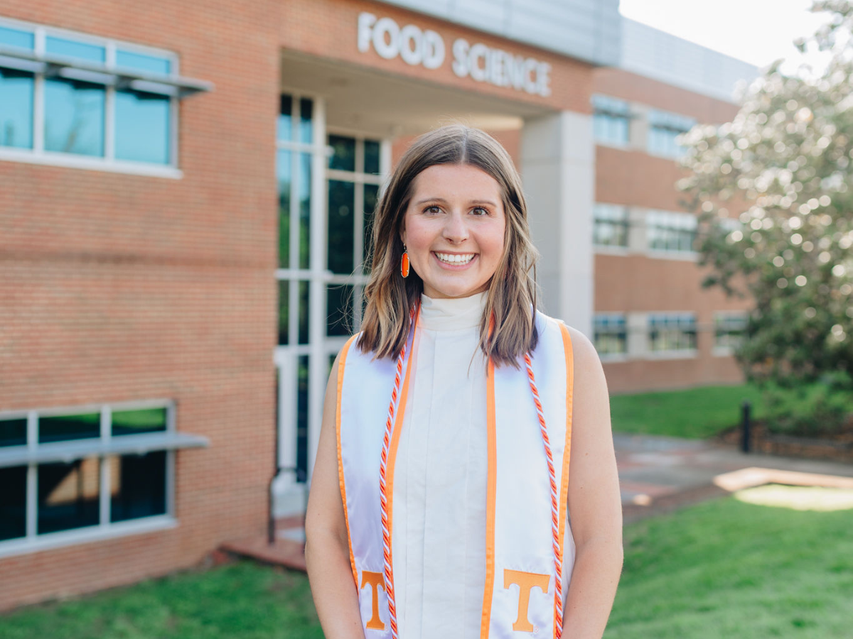 Miller standing in front of the Food Science building